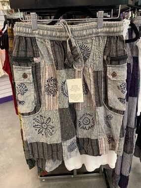 Rising International patchwork shorts with elastic drawstring waist & pockets